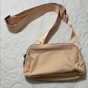 Ododos  Crossbody Bag Peach color